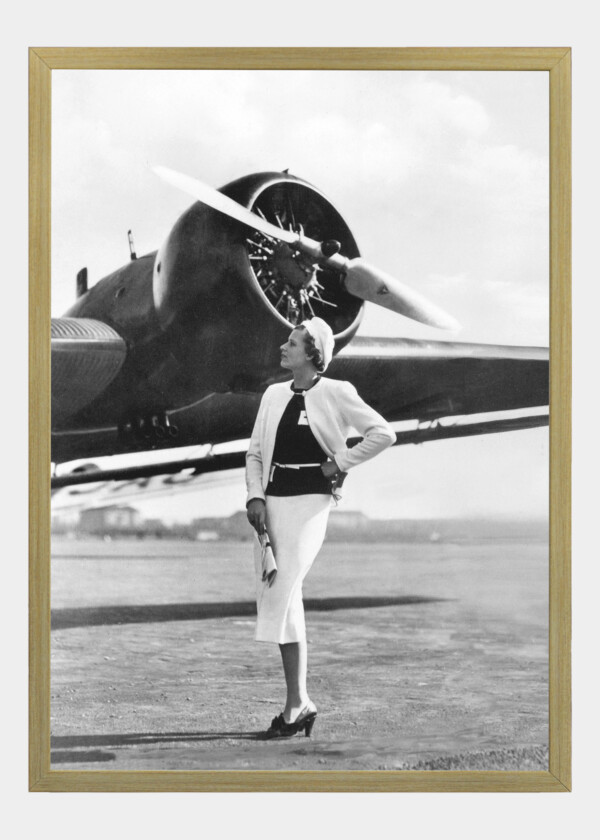 VINTAGE AIRPLANE AND NICELY DRESSED WOMEN