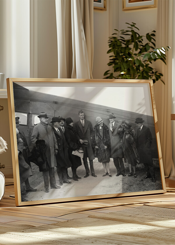 CHARLES LINDBERGH AND GROUP NEXT TO AIRPLANE.1928