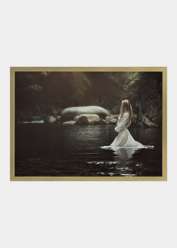 WOMAN IN WHITE DRESS WALKS IN THE LAKE