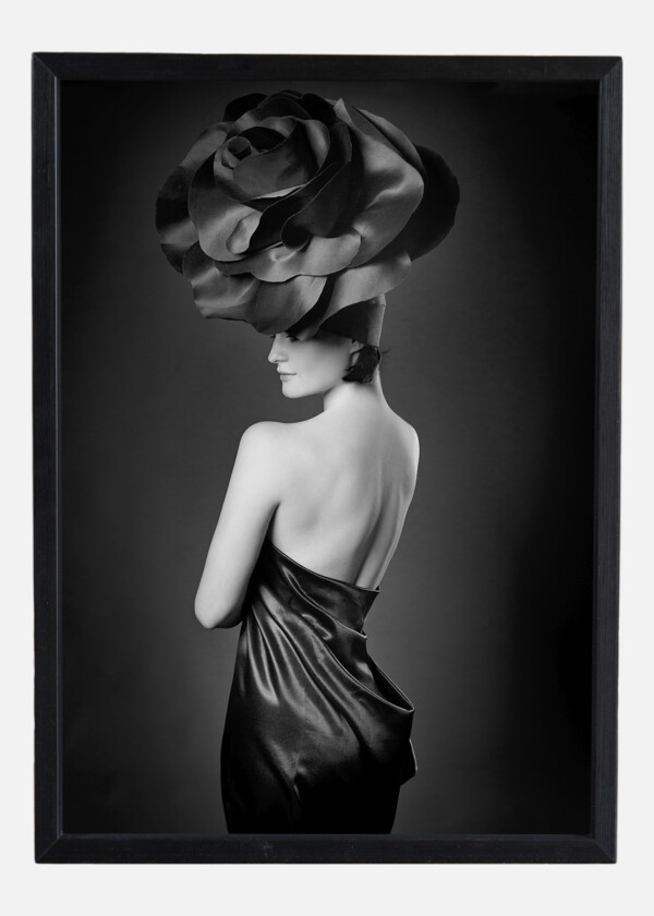 BLACK AND WHITE PORTRAIT OF A GIRL IN A DARK ROSES SUIT