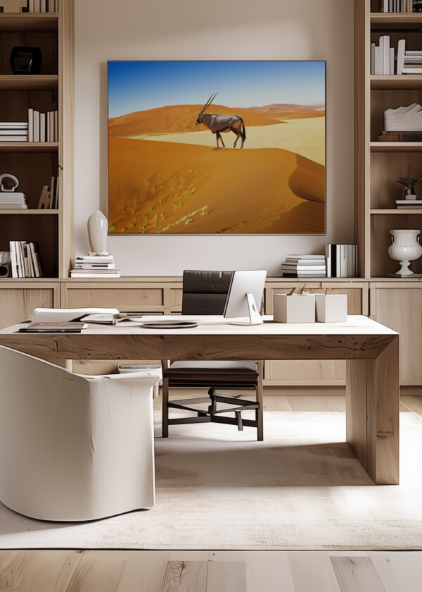 WANDERING DUNE OF SOSSUVLEI IN NAMIBIA WITH ORYX WALKING ON IT