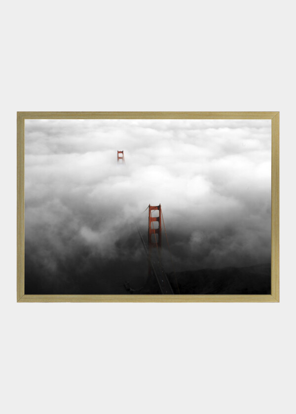 AERIAL VIEW OF THE GOLDEN GATE BRIDGE WITH FOGGY WEATHER